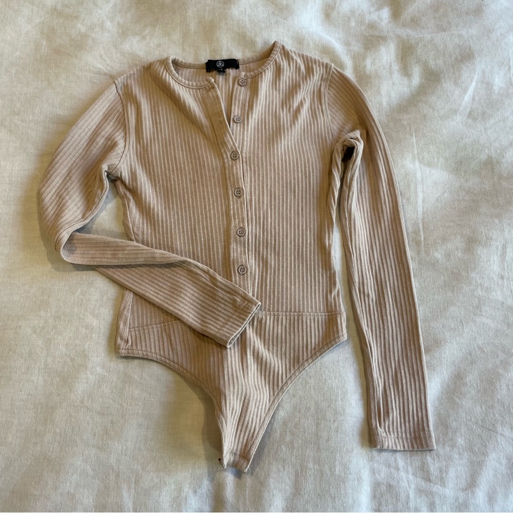 Cream/coral cozy bodysuit with buttons up the front